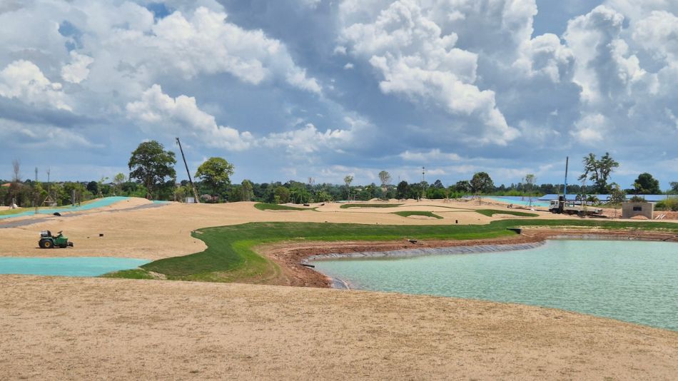 Golf course with ball near flag