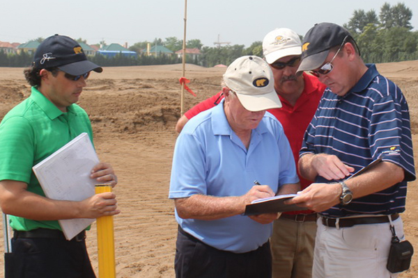 Golf course with ball near flag