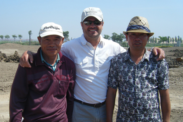 Golf course with ball near flag