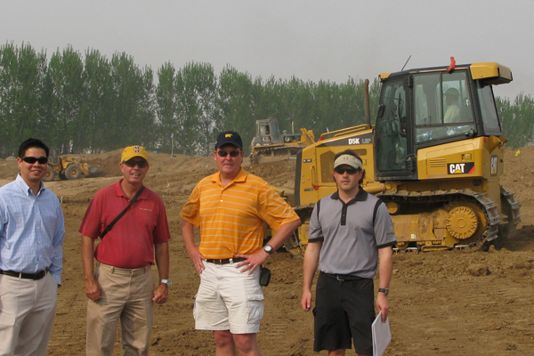 Golf course with ball near flag