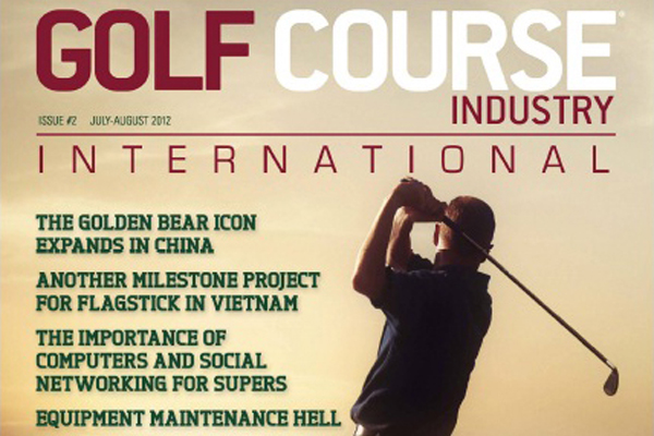 Golf course with ball near flag